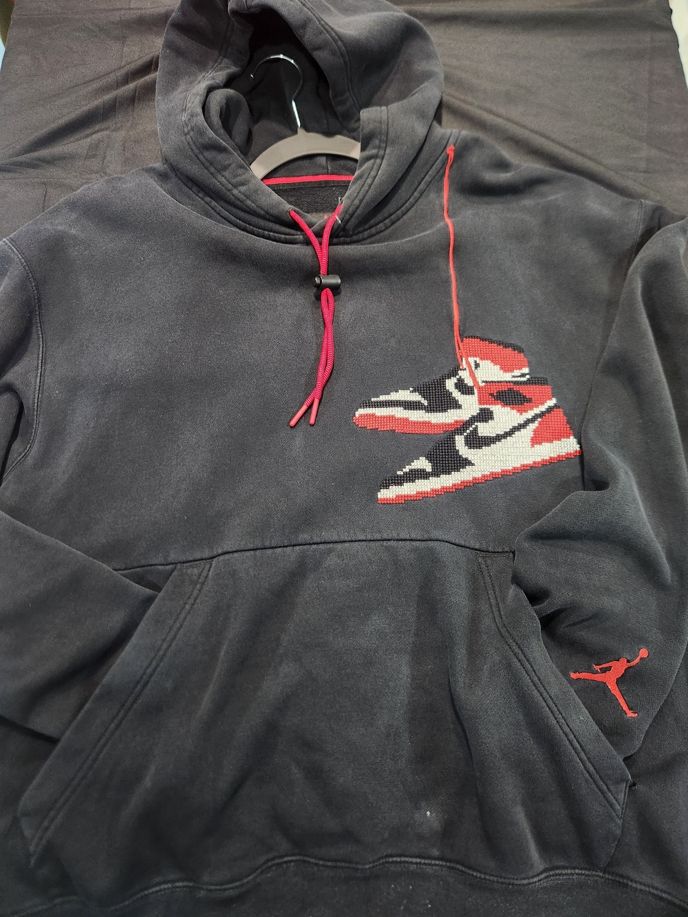 Jordan Black Hoodie with Red and White Sneaker Graphic